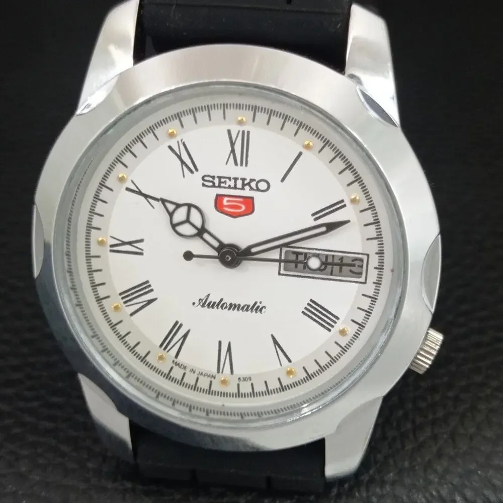 Vintage 1973 Seiko Automatic Mens Silver Watch W/daydate & White accents